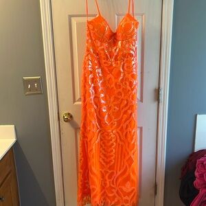 COPY - A beautiful neon orange dress with sequins designing.
